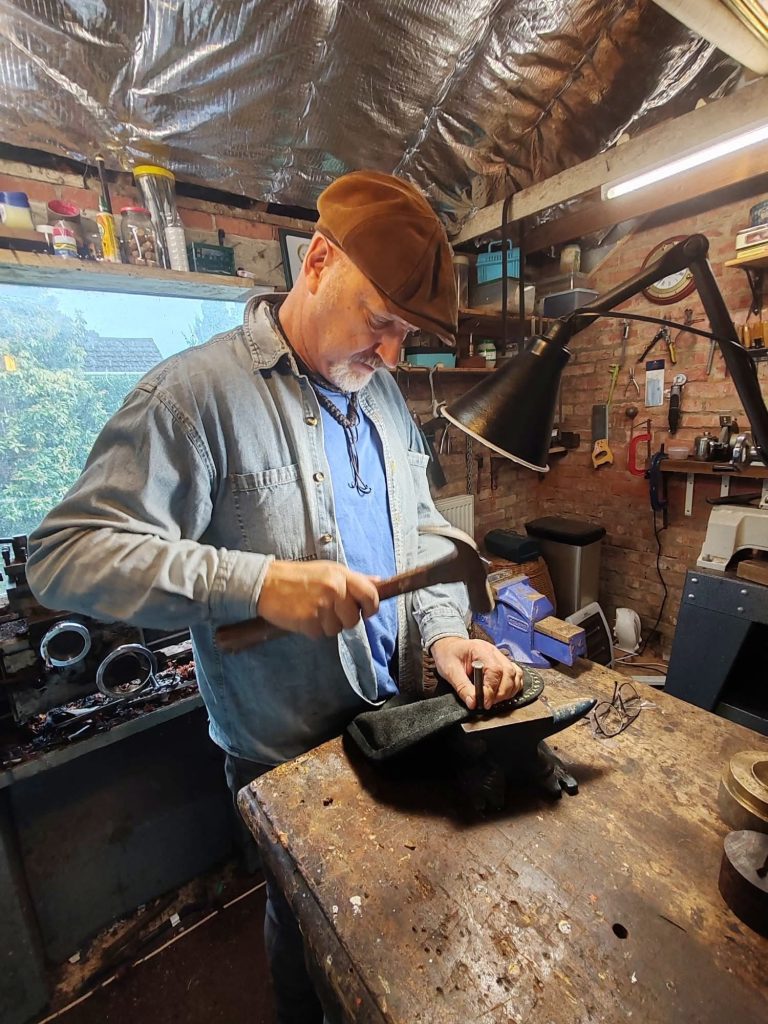 Jaff working on a bag