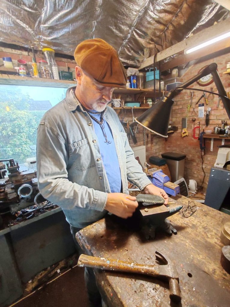 Jaff working with a bag for a set of pipes