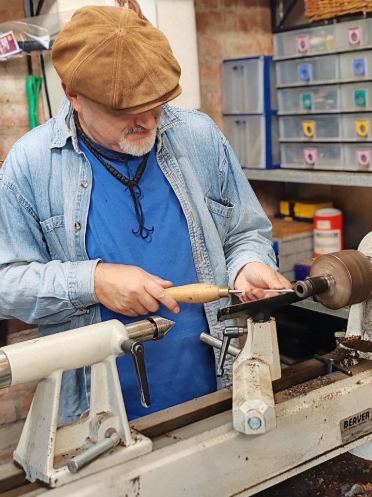 Jaff working with a lathe